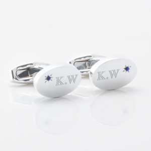 Sterling silver oval offset sapphire engraved cufflinks